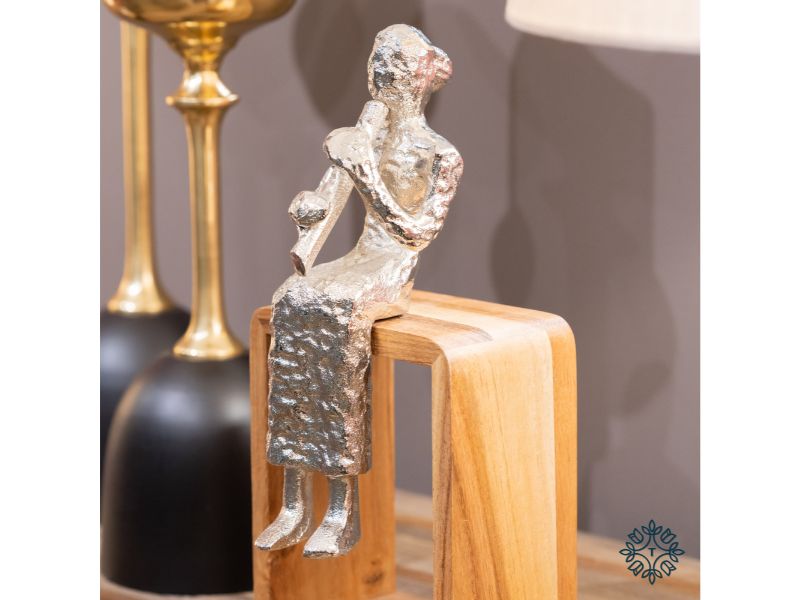 Sitting Musician Flute Silver