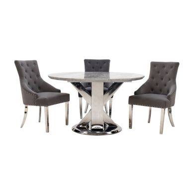 tremmen_round_dining_table_with_estela_chairs.jpg